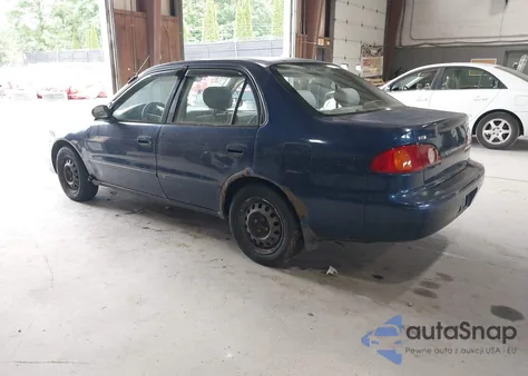 2001 Toyota Corolla Le z USA, uszkodzony, nr VIN 2T1BR12E41C445877